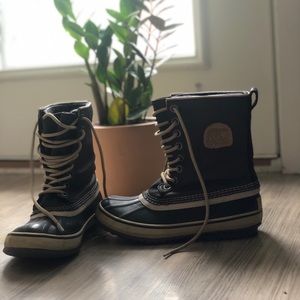 Black and tan leather Sorel Boots
